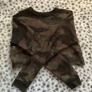 A see through camouflage long sleeve size small
